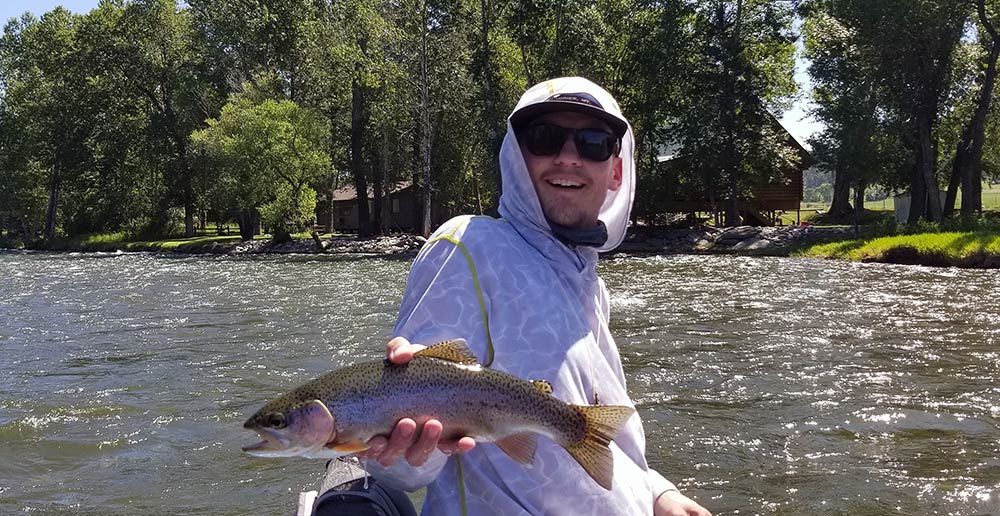 rainbow trout caught with a stillwater river fishing guide
