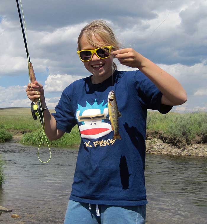 girl with brook trout
