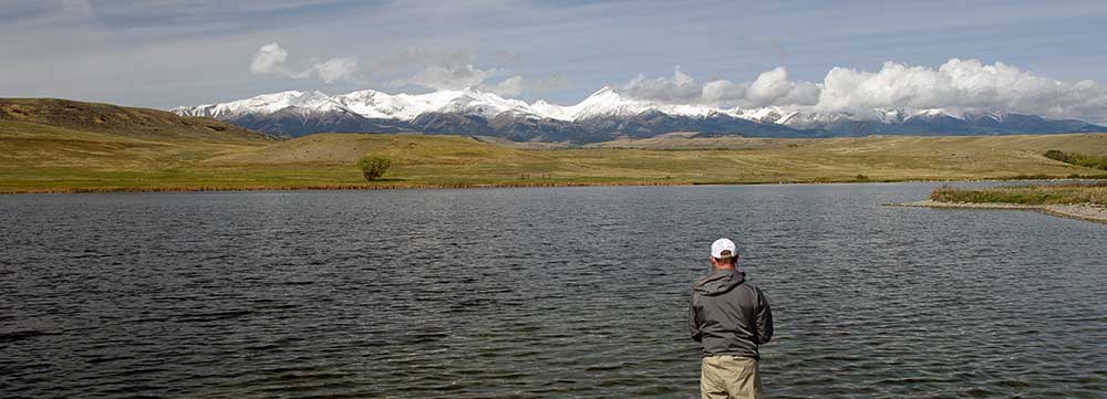 fishing a montana lake in fall