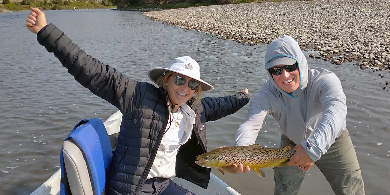 decorative image showing a fly fishing scene. may include happy angler, trout, scenery, etc