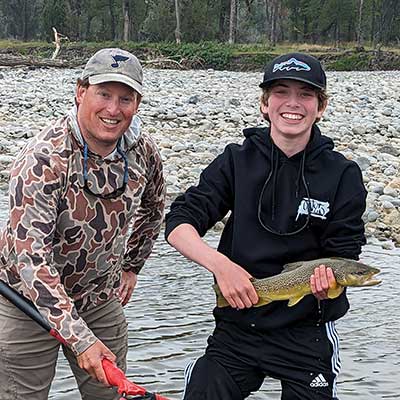 photo demonstrates a river float trip with yellowstone country fly fishing