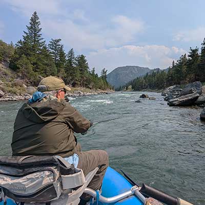 photo demonstrates a river float trip with yellowstone country fly fishing